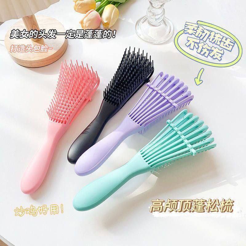 فرشاة للشعر الكيرلي