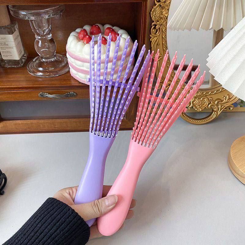 فرشاة للشعر الكيرلي